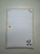 Kit papelaria Caderno Ovelhinha com 100 folhas de 90 gramas, ,2 blocos de anotações, 02 bottons personalizados e 02 clips