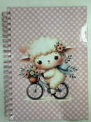 Kit papelaria Caderno Ovelhinha com 100 folhas de 90 gramas, ,2 blocos de anotações, 02 bottons personalizados e 02 clips